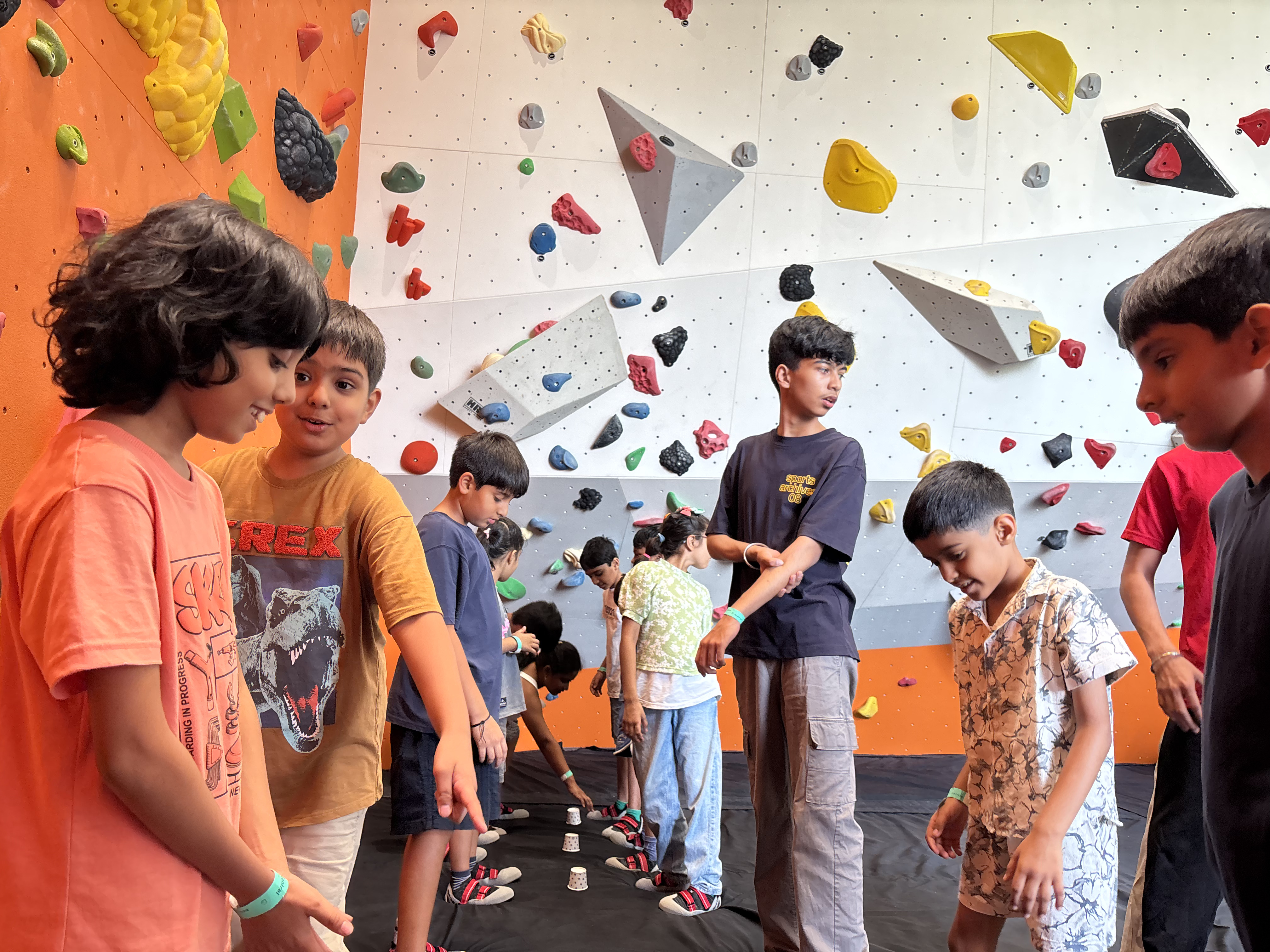 Group climbing together at Climb Central