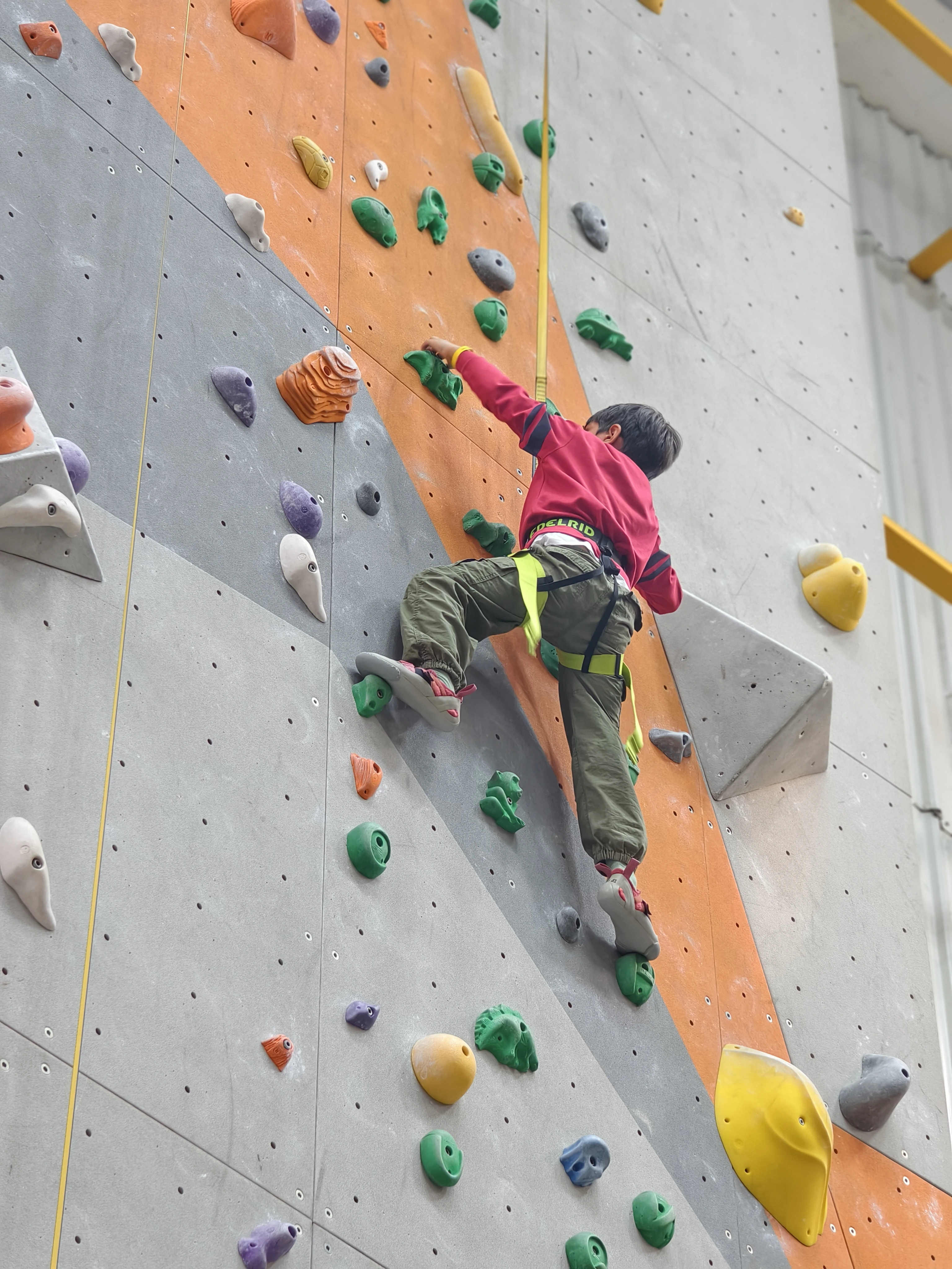 Kids climbing at winter camp